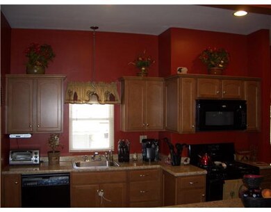 Kitchen. Remodeled kitchen with honey oak cabinets