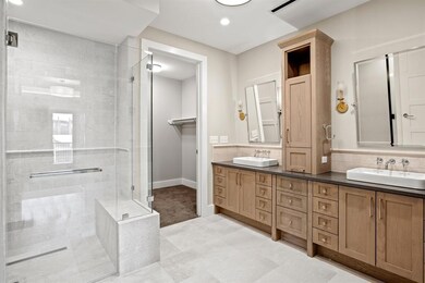 His and hers sinks, walk in shower with shaving be