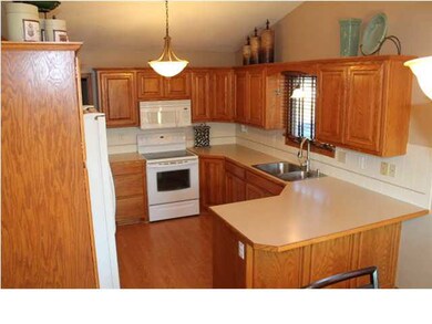Tons of cabinets and all appliances remain.