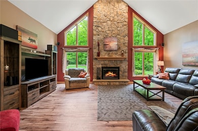 This focal point of the hom is this rustic stone f