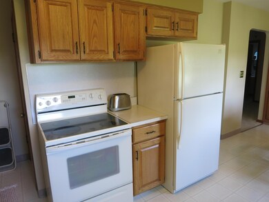 Electric range, refrigerator.