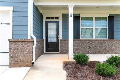 Entrance to property featuring a porch