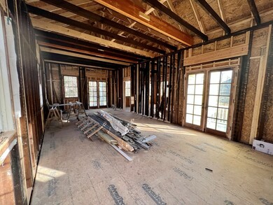 Additional view of living Area with high ceilings