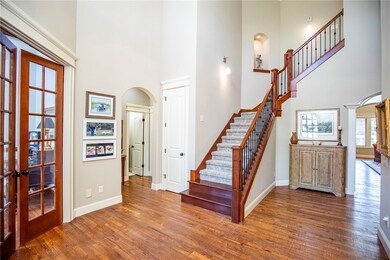 Grand entry with office and dining room