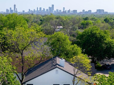 Aerial view featuring a view of city