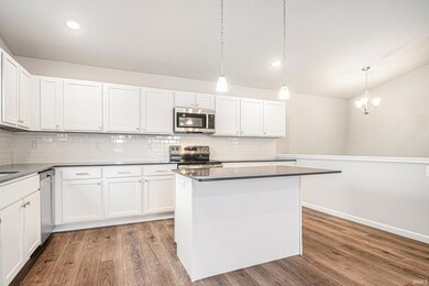 The kitchen includes Quartz counters with subway t