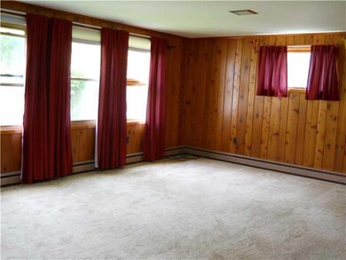 Living Room. Knotty pine, tongue in groove panelin