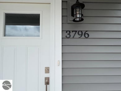 3796 Woodgate Dr unit 2, Traverse City, MI 49686 - photo 3