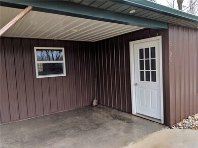 Front door into mud room (Foyer). 10 x 12. Window 
