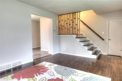 Living room entry and stairs to upstairs bedrooms 