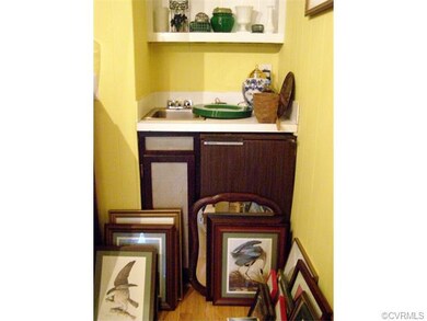 Near the rear of the Den/Family room you find a we