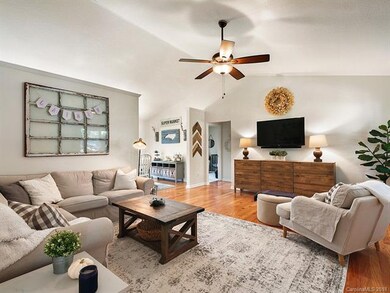 Living room open to dining room