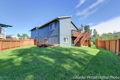 Freshly stained decks, fenced yard