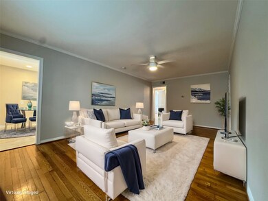 Living area. Hardwood floors and additional closet