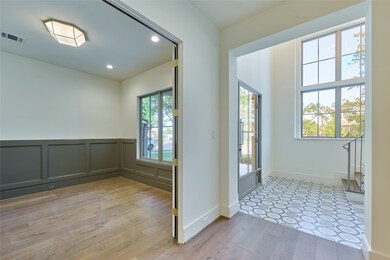 Welcome open foyer with a view of the office/study