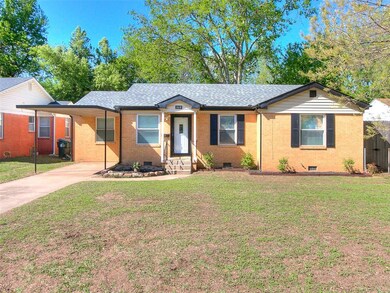 Ranch-style home with a front yard