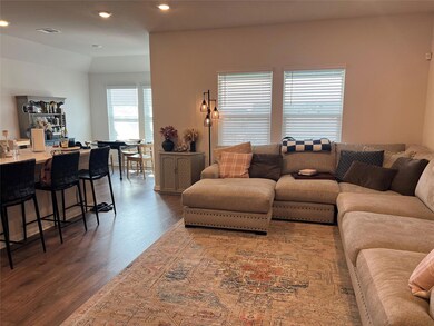 Living room featuring wood finished floors and re