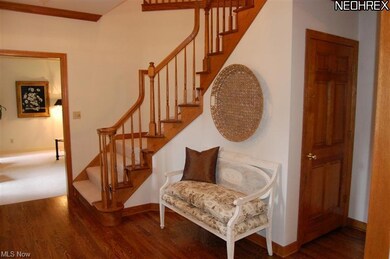 Solid hardwood doors throughout, curved staircase,