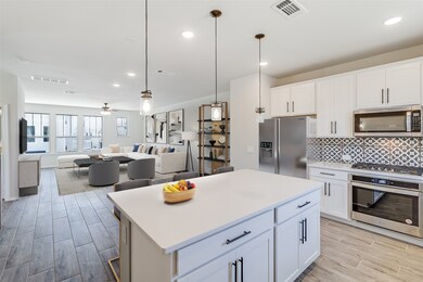 The open concept living room and kitchen makes for