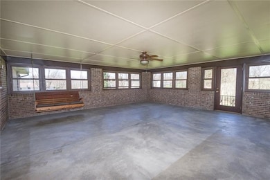 This fantastic 24 x 24 enclosed porch is accessibl