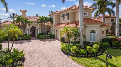 Mediterranean / spanish home with a garage and a f