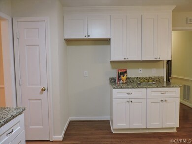 Plenty of counter space, cabinets and a pantry in