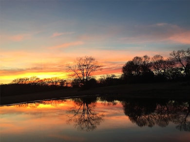 Idyllic sunset view over the pond to help you unwi