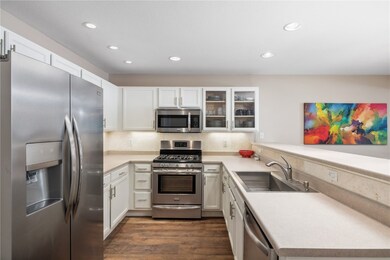 Kitchen featuring stainless steel appliances, sink