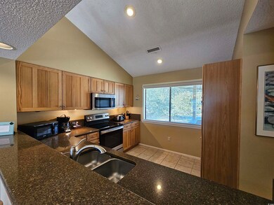 Kitchen with appliances with stainless steel finis