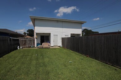 Each side has it's own large fenced in backyard wi