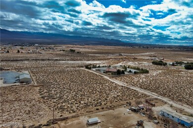 Aerial view with a desert view and a mountain view