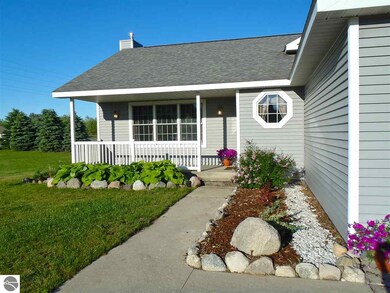 7874 E Longbranch Cir, Traverse City, MI 49684 - photo 5