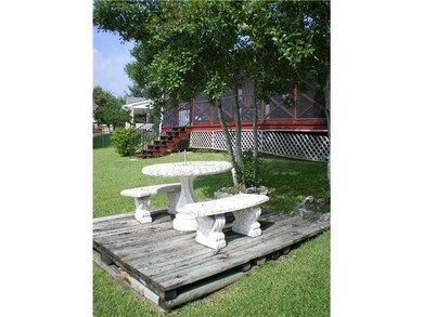 Backyard. Great serene spot. Add umbrella, friends