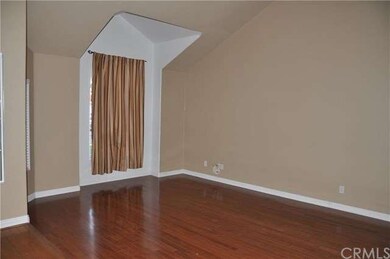 High ceilings and beautiful wood floors in entry, 