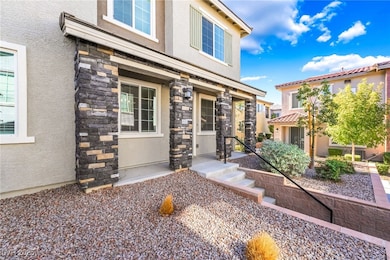 View of exterior entry featuring stone siding, stucco siding, and a porch