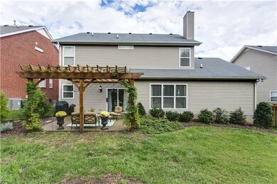 The level backyard is well landscaped and has a walkout patio.  