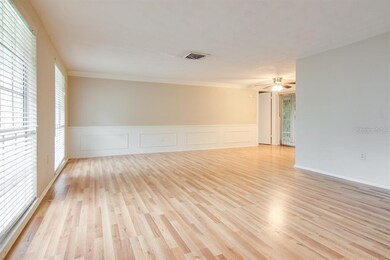 bright open and spacious living room, open to dini
