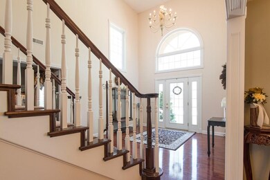  What an exquisite entryway and that chandelier is beautiful!! 