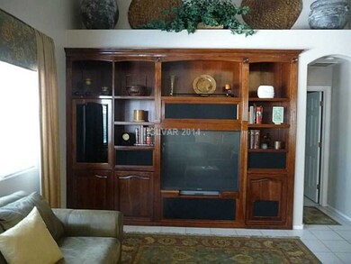 Property Photo. Entertainment center in living roo