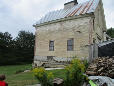 left side of attached barn