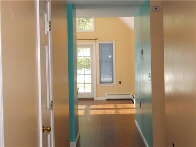 Front entry hall. Small bedroom...