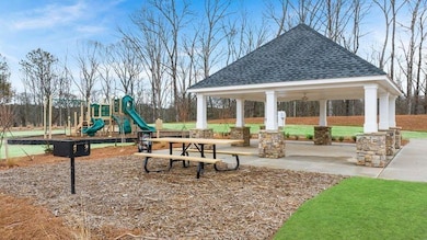 View of jungle gym featuring a gazebo