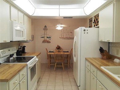Kitchen features lighted ceiling with solar tube w