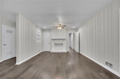 Unfurnished living room with visible vents, ceilin