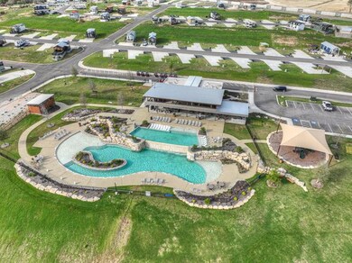 View of property location with a pool area