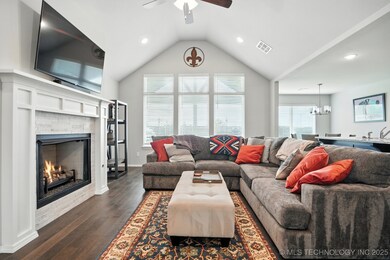 Living room with cathedral ceilings and view