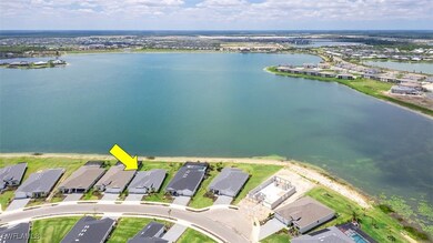 Aerial view of home and Lake Babcock