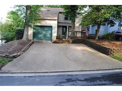 Aggregate Driveway Leading to Garage