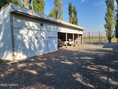 Covered Parking with Large Man Cave