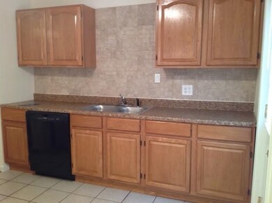 New Kitchen with Tile Backsplash, cabinet, floors,